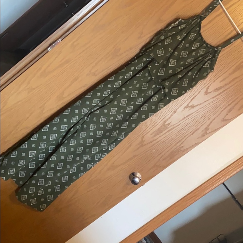 olive green woven jumpsuit with adjustable straps